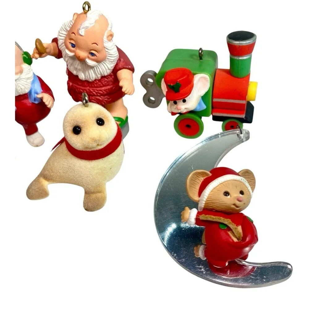 Lot of 7  Hallmark Keepsake Ornaments Vintage 80s Assorted Santa Seal Train